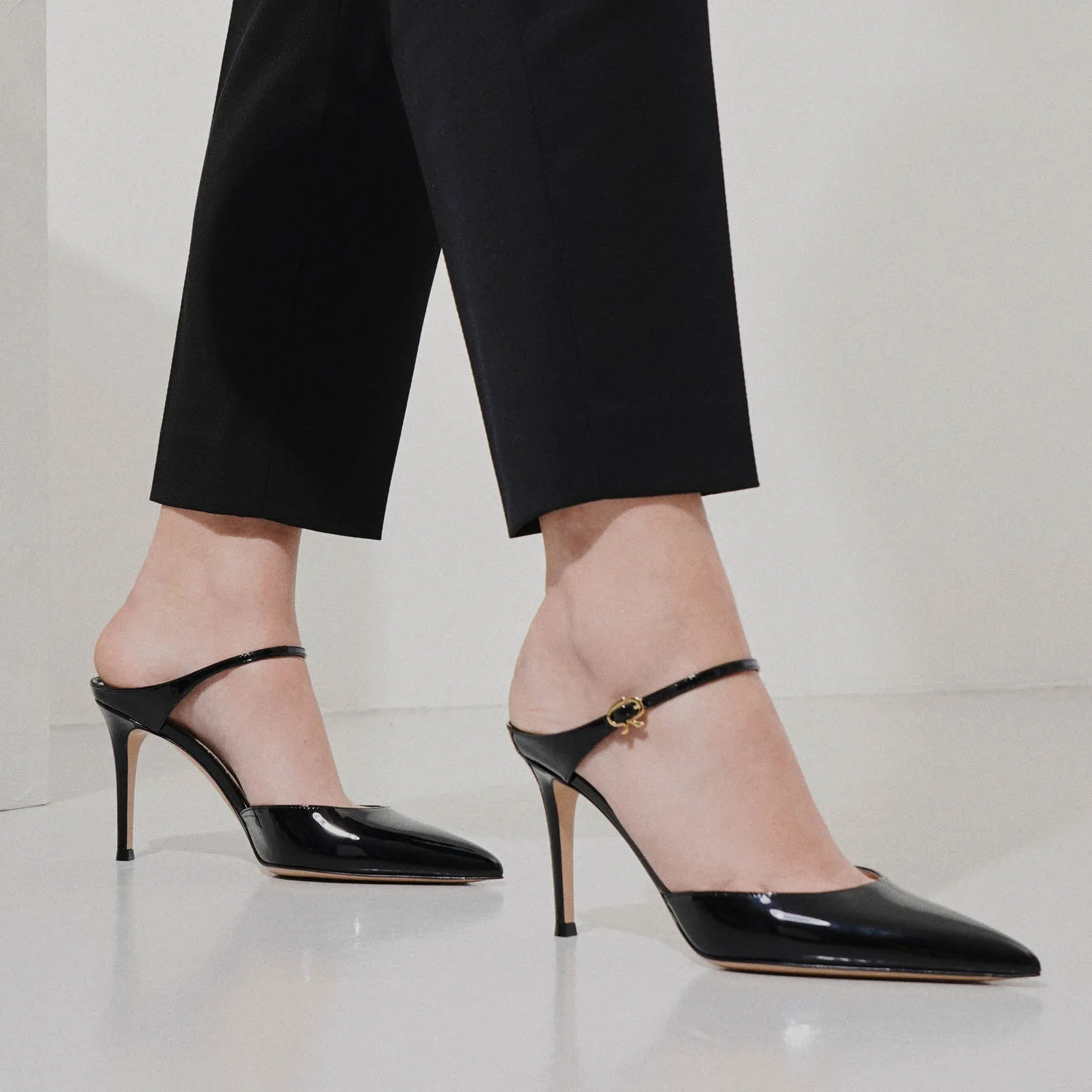 Black 85 patent mule pumps